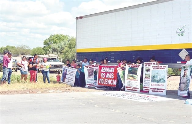 Incautan arsenal y narcopancartas Incautan arsenal y narcopancartas