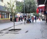 Bajan ventas por lluvias y leve frío, en la peatonal