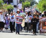 Marchan y rezan por las víctimas del rancho de Teuchitlán