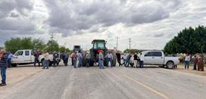 Productores levantan bloqueos carreteros