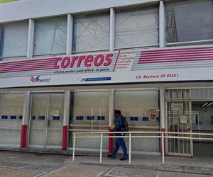 Trabajan bajo protesta trabajadores postales