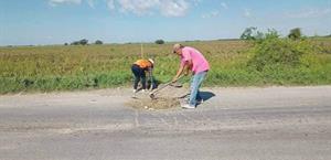 Rellenan baches de la brecha 124