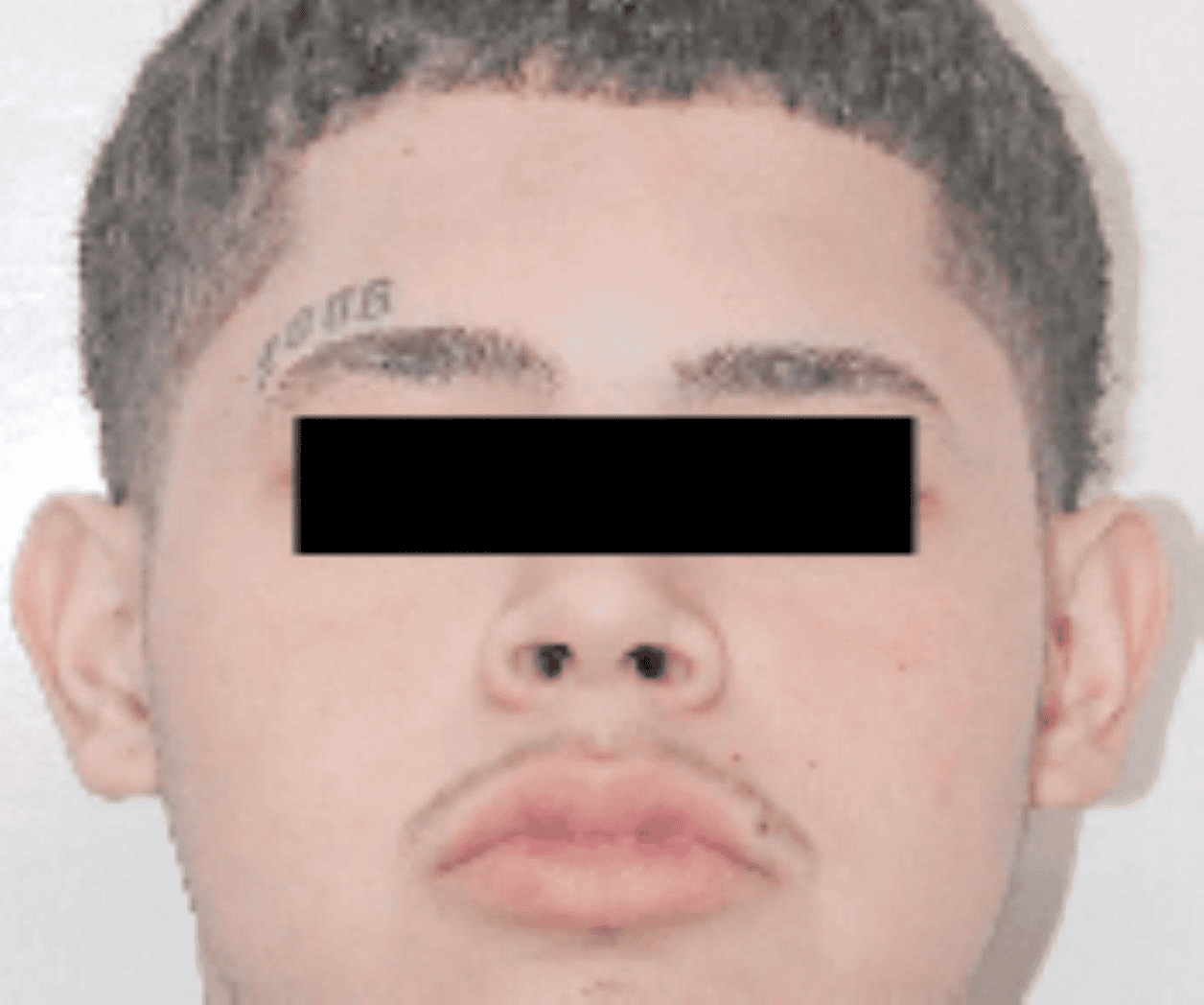 Arrestan a fugitivo buscado por homicidio
