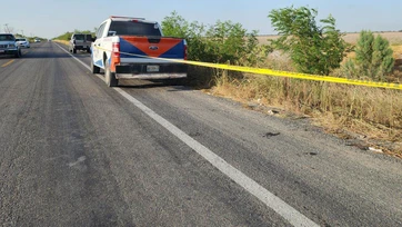 Reportan cuerpo tirado en carretera